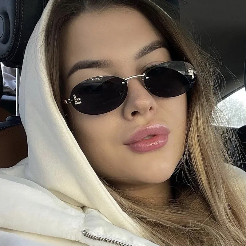 Retro Rimless Oval Cat Eye Sunglasses—Punk UV400 Shade - Image 4